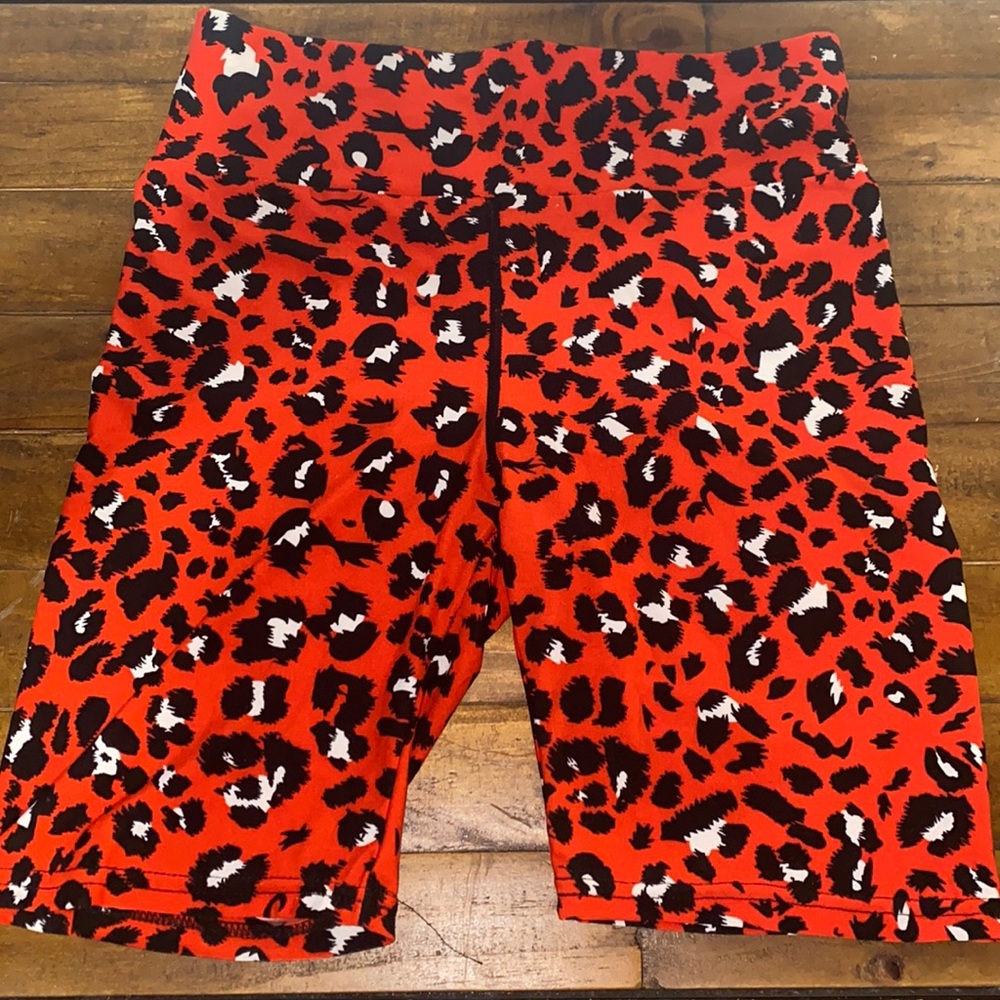 Animal print red spandex biker shorts.